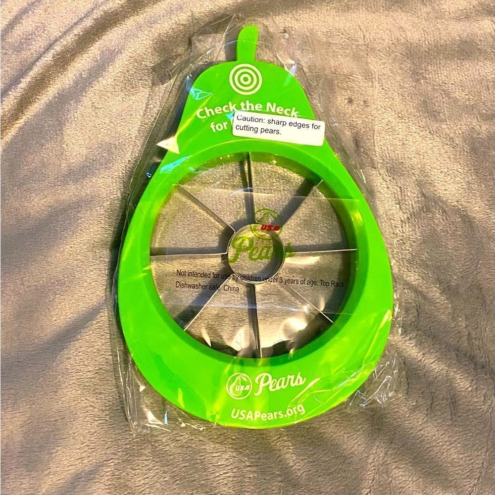 New and sealed, Green Pear Shape Fruit Slicer
Corer